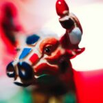 Close-up of a colorful bull figure representing market trends